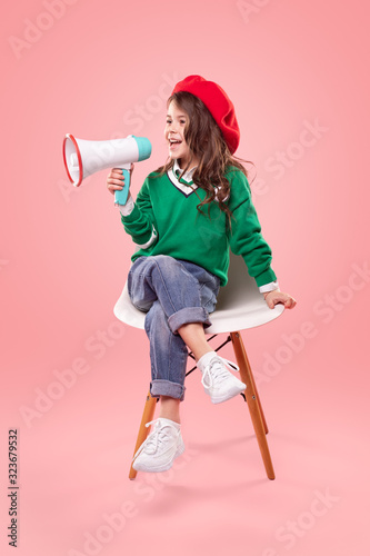 Little movie director with loudspeaker photo