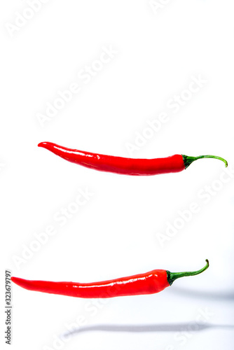 red chili peppers on a white background