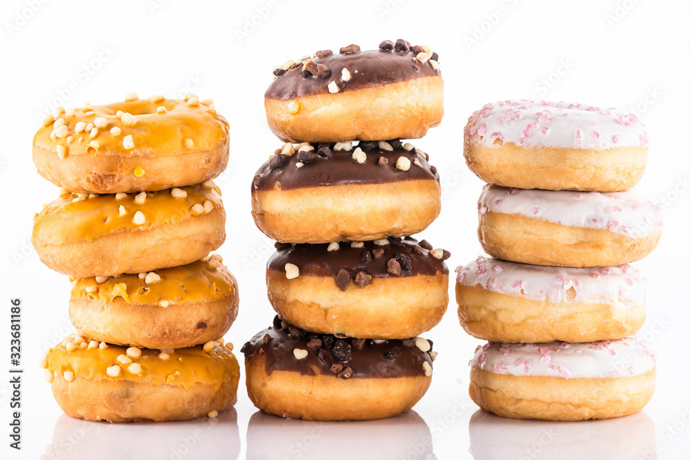 Donuts or Doughnuts Tower on White Background. Donut Stack Pile Food Background