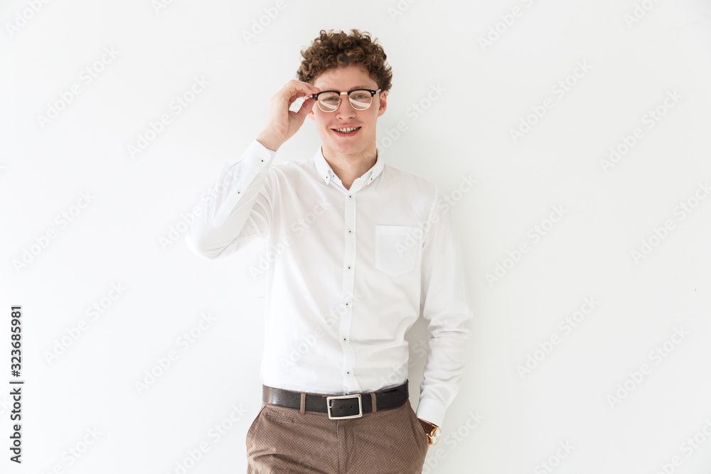 Handsome confident young curly haired businessman Handsome confident young curly haired businessman