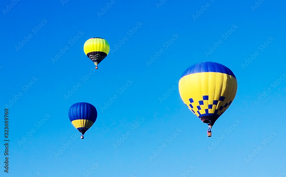 Air balloon on the blue sky background