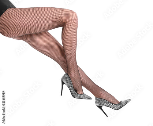 Woman wearing black tights and stylish shoes isolated on white, closeup of legs