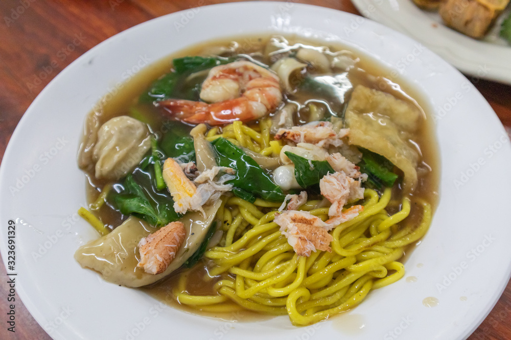 eggs noodles with Seafood in Gravy Sauce, Satun province southern of Thailand