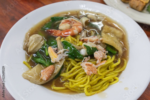 eggs noodles with Seafood in Gravy Sauce, Satun province southern of Thailand