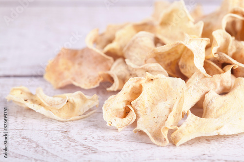 Dried dehydrated sweet potato chips. Delicious organic eco-friendly snack for the whole family. Healthy eating concept.