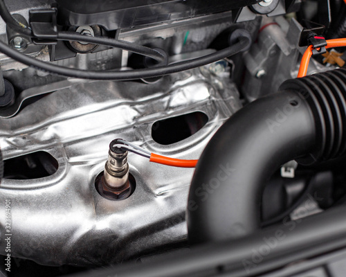 Принти на полотні Sensor lambda probe in an internal combustion engine in the engine compartment