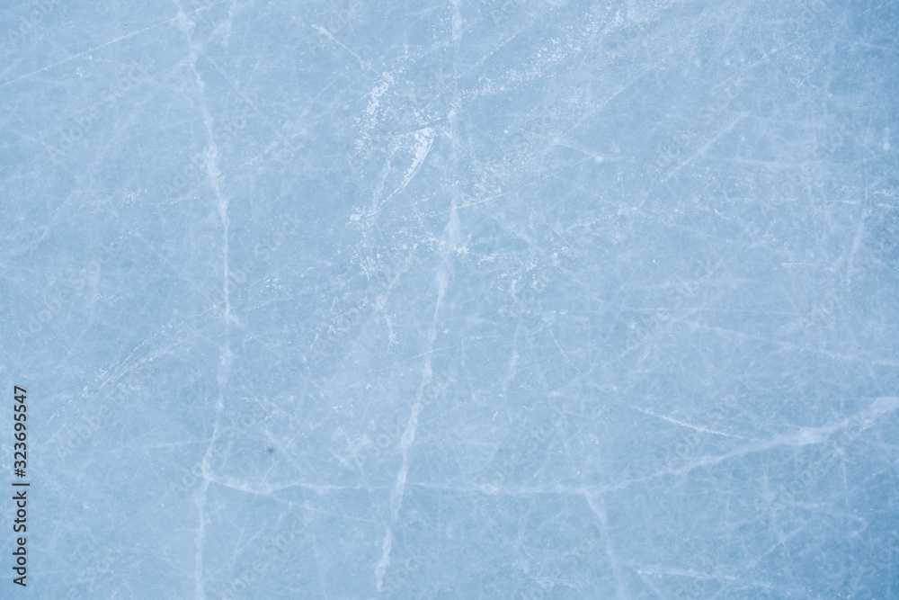 Obraz premium texture of ice on the rink with skating traces 