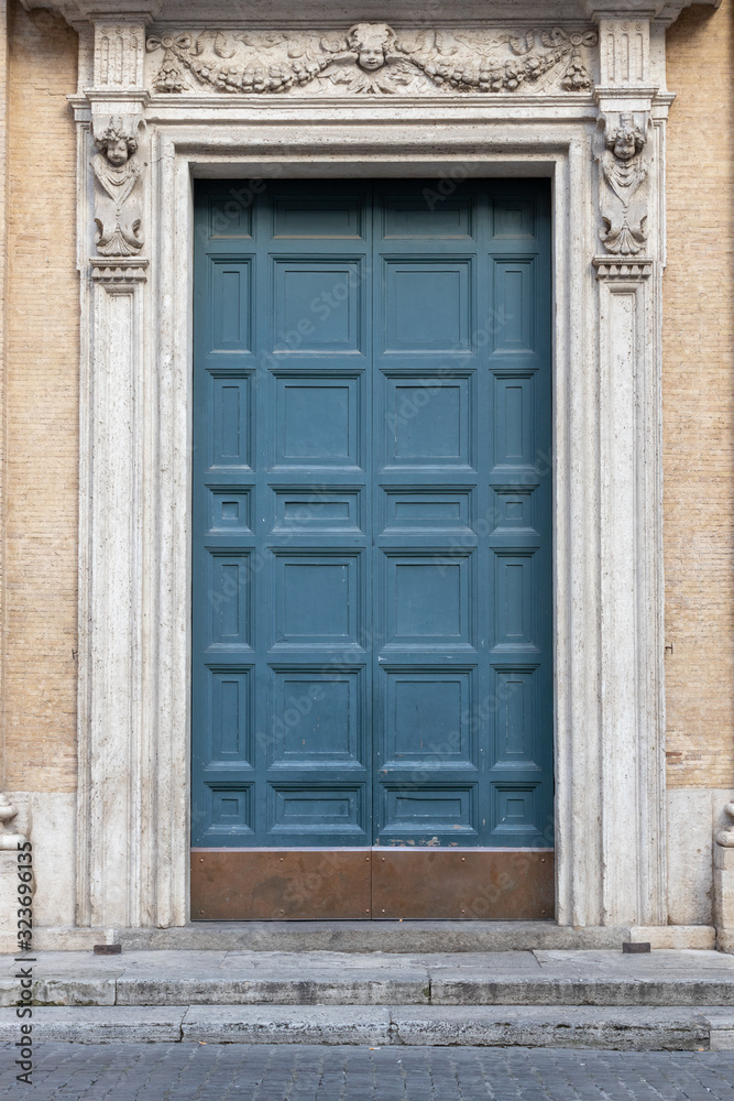 ancient green wooden arched door, Italy Europe ancient green wooden arched door, Italy Europe