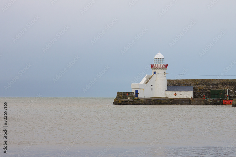 Lighthouse calm before storm Dennis- Balbrigan, Ireland