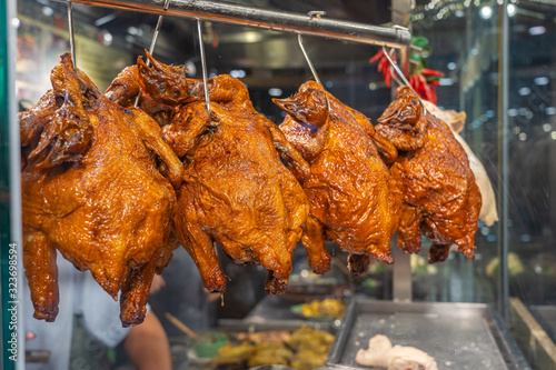 Canvas Print Delicious roasted whole chickens displayed in Singapore food restaurant
