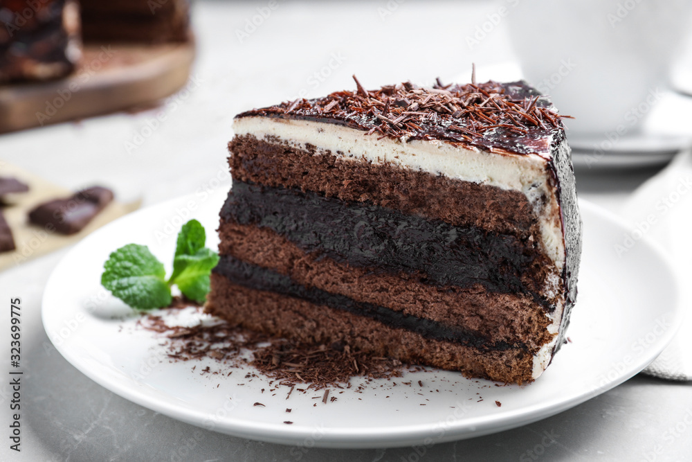 Tasty chocolate cake served on table, closeup Tasty chocolate cake served on table, closeup
