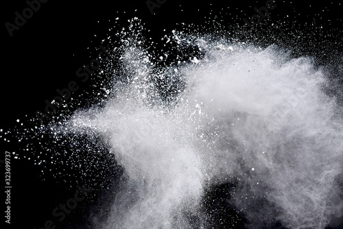 Fototapeta Naklejka Na Ścianę i Meble -  White powder explosion on black background. 