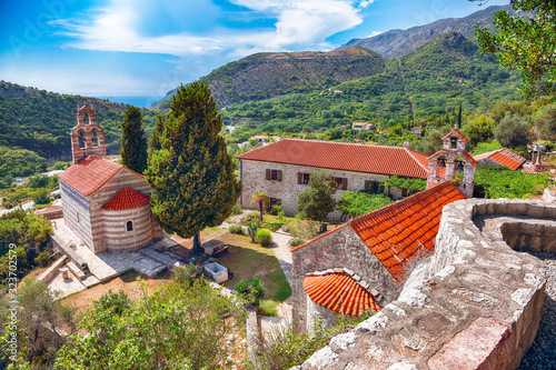 Stone church with bell tower at Gradiste monastery near Buljarica, Montenegro.