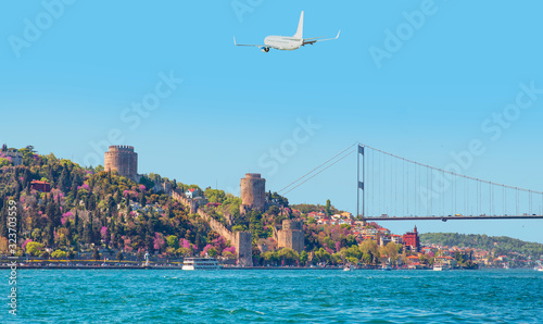 Photography Airplane flying above the Rumeli Hisari (fortress) in to Bosphorus Sea - Istanbu