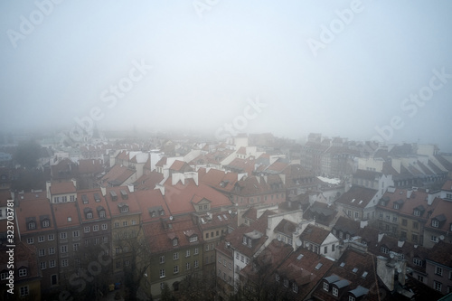 Aerial view of the Warsaw Historic Center in fog.