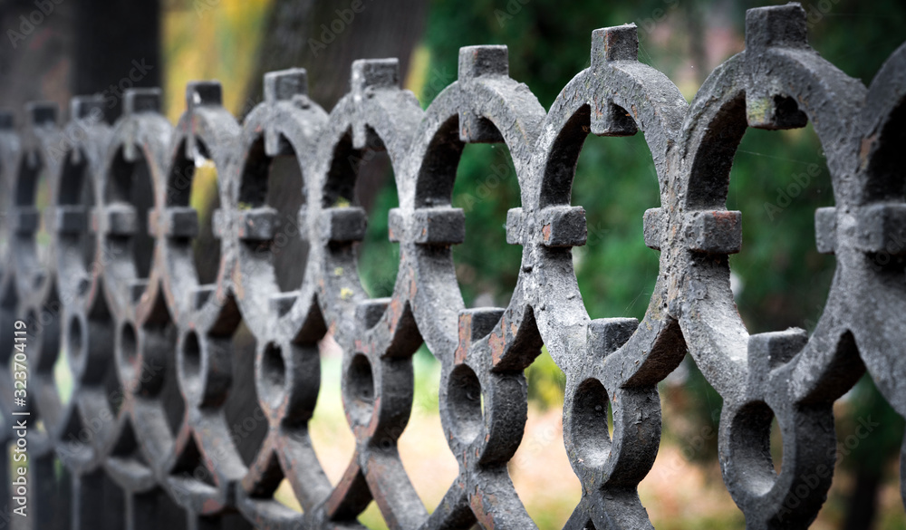 Old rusty forged fence, close up Old rusty forged fence, close up