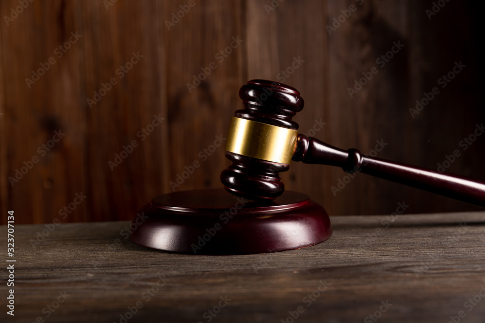 Law and judgement concept. Wooden gavel as a legal auction simbol Law and judgement concept. Wooden gavel as a legal auction simbol