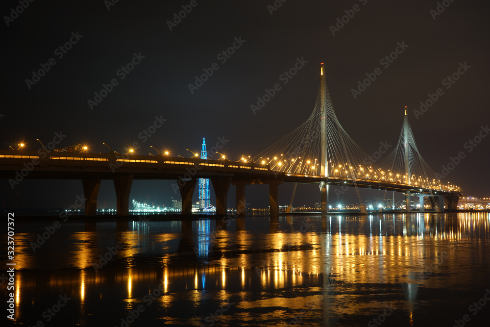 A night shot of the new bridge in Saint-Petersburg near the Zenit arena and Gazprom tower