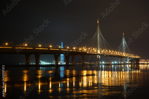 A night shot of the new bridge in Saint-Petersburg near the Zenit arena and Gazprom tower photo