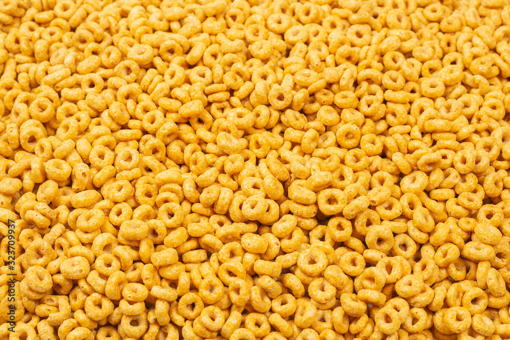 Corn-flakes background and texture. Top view. Corn-flakes background and texture. Top view.