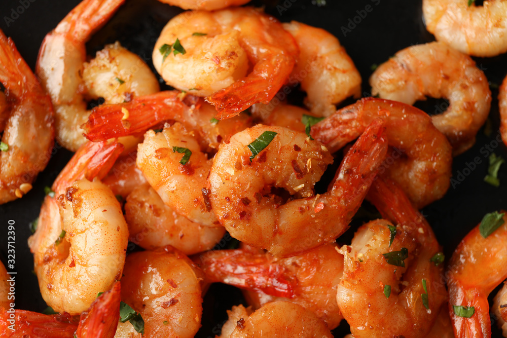 Delicious cooked shrimps on plate, close up Delicious cooked shrimps on plate, close up
