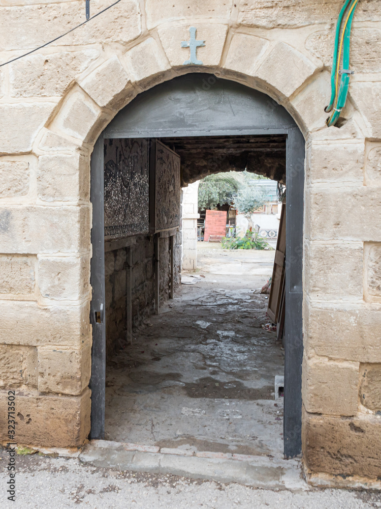 Side entrance to the monastery of Gerasim Jordanian - Deir Hijleh - in the Judean desert near the city of Jericho in Israel