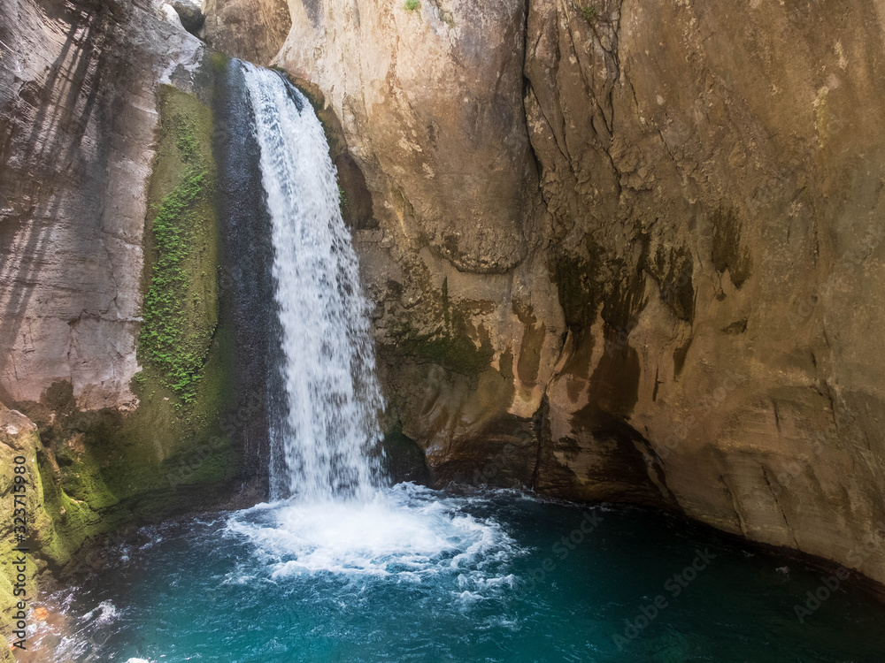 Naklejka premium Waterfall and natural pool at Sapadere Canyon, Alanya, Antalya, Turkey