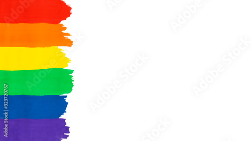 Lgbt background with copy space. Abstract painting rainbow gradient, hand drawn.