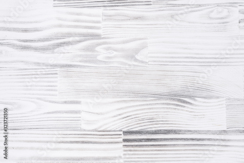 Whitepainted natural wood with grains for background and texture. photo