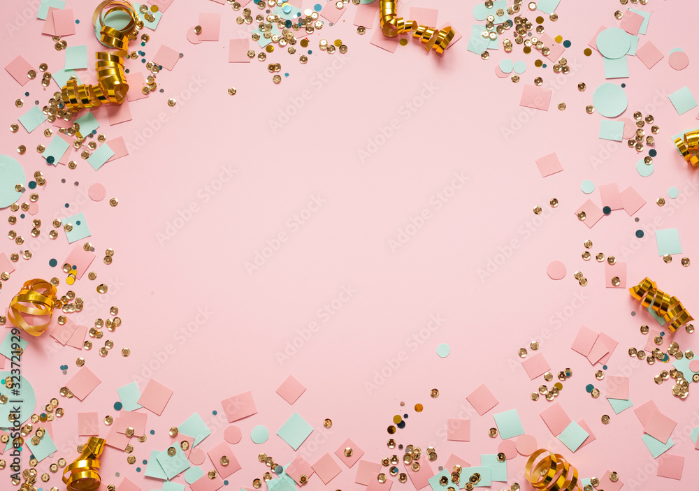 Sequins and confetti frame for copy space pink background Sequins and confetti frame for copy space pink background