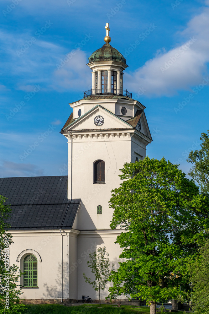 White church in Sweden in summer sunlight