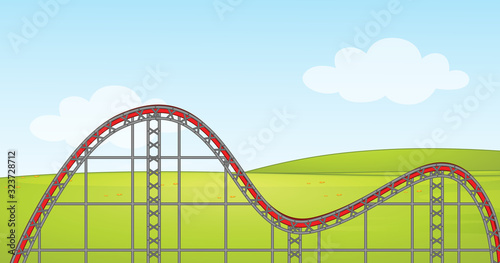 Scene with empty roller coaster track in the park