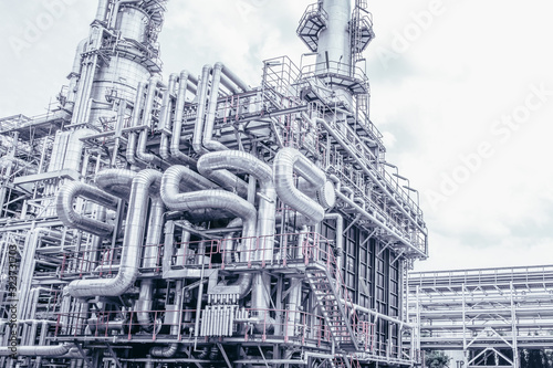 Industrial zone,The equipment of oil refining,Close-up of industrial pipelines of an oil-refinery plant,Detail of oil pipeline with valves in large oil refinery.