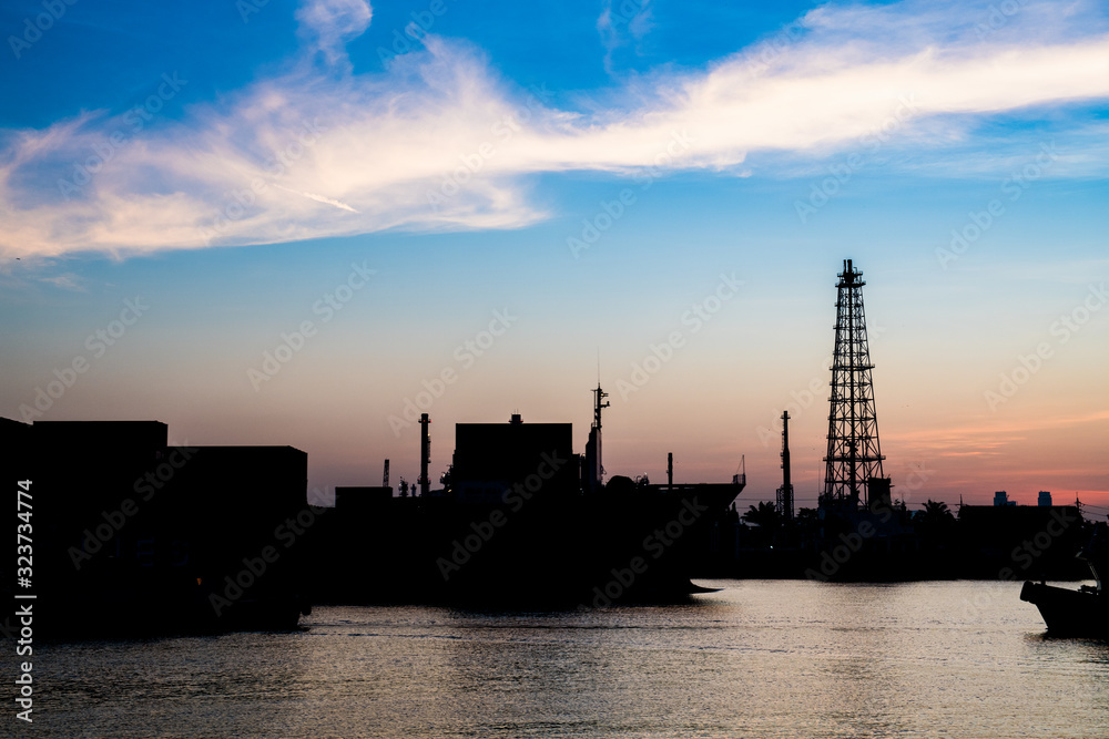 Oil refinery or petrochemical industry with ship in thailand. for Logistic Import Export background. Oil refinery or petrochemical industry with ship in thailand. for Logistic Import Export background.