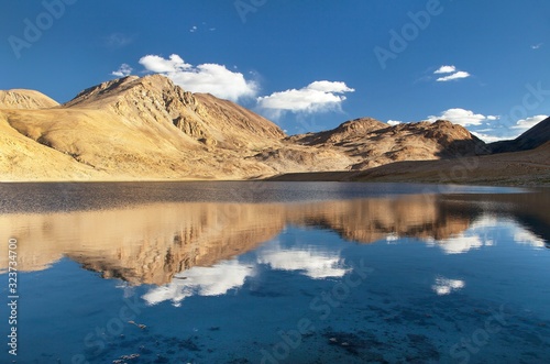 Pamir mountains mirroring in lake
