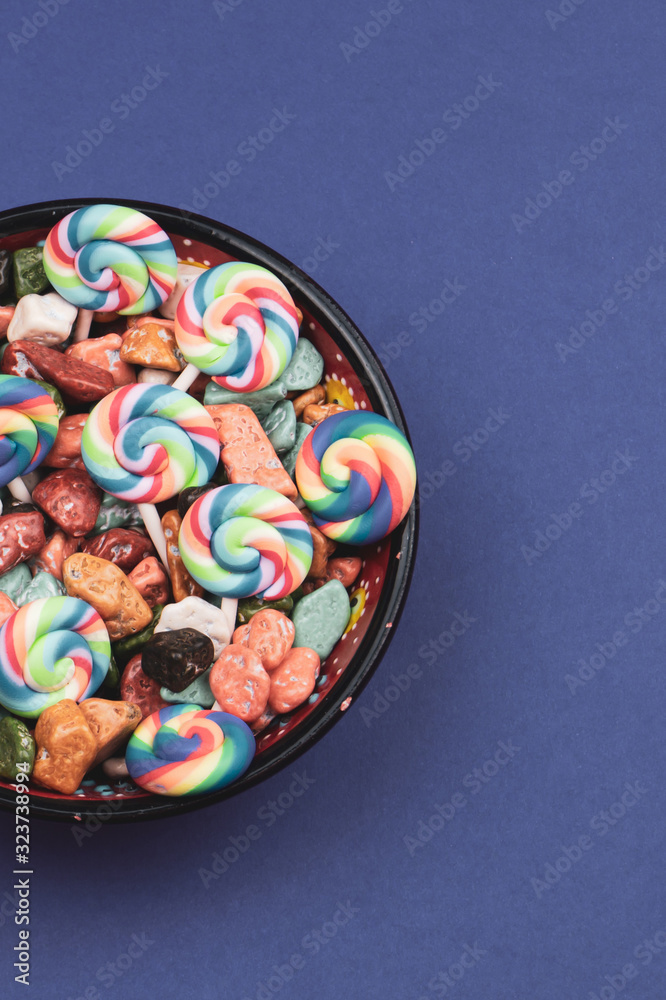 Lollipops and candies. candy bowl with sweets in the form of colored stones