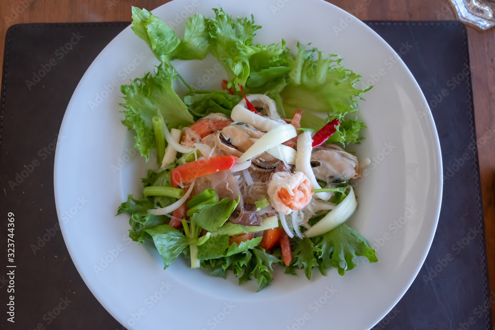 Fresh salad with seafood and tomato. Sea food salad. Fresh salad with seafood and tomato. Sea food salad.