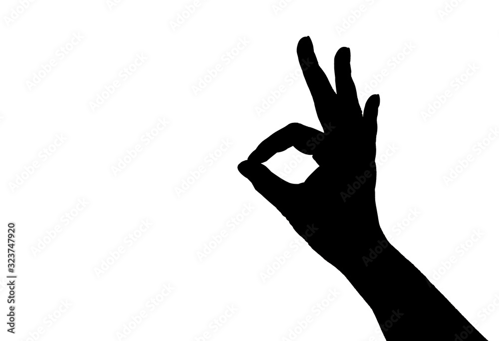 OK-Silhouette of woman hand on white background. OK-Silhouette of woman hand on white background.