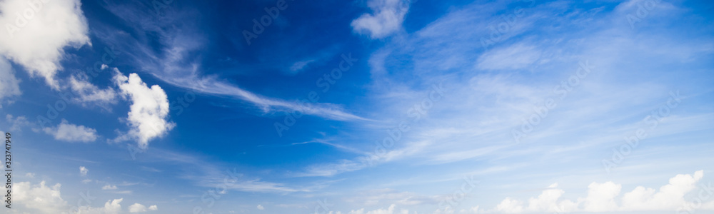Fototapeta premium blue sky with white, soft clouds