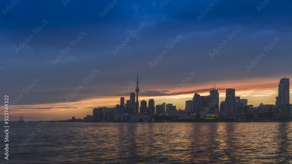 Sunset time lapse from day to night with waterfront in shot, Toronto, Canada Sunset time lapse from day to night with waterfront in shot, Toronto, Canada