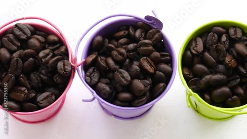 coffee beans in bowl isolated on white background. organic coffee seed in a bucket