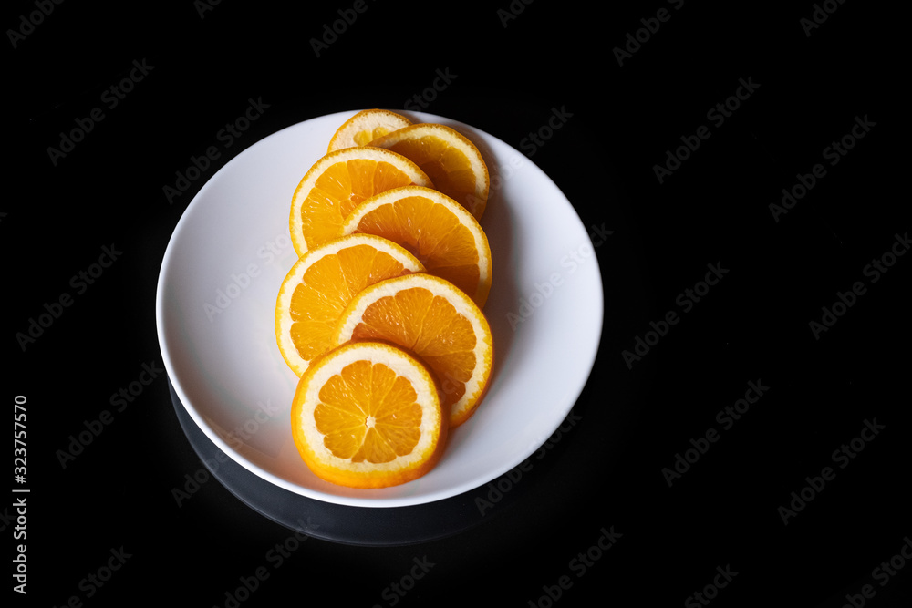 Ripe orange isolated on black background Clipping Path