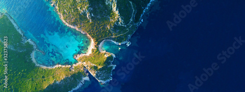 Aerial drone wide photo of paradise exotic lagoon with turquoise rocky beach photo