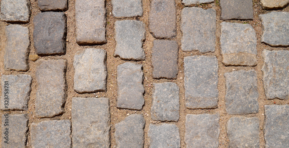 Old paving stones closeup, background, texture. Old paving stones closeup, background, texture.