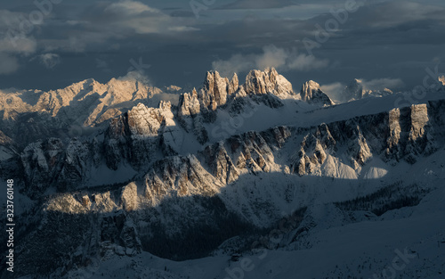 Overview of the Croda da Lago and Lastoi de Formin mountains illuminated by the sun after a heavy snowfall, view from the Lagazuoi refuge, Falzarego, Cortina d'Ampezzo, dolomites, Italy, Europpe photo