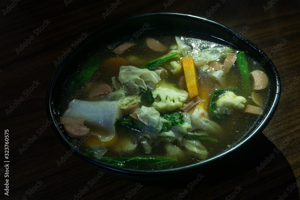 bowl of cap cay or vegetable soup bowl of cap cay or vegetable soup