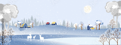  Christmas night with snowdrifts, blizzard, firs and pine tree forest, Winter landscape scene of  reindeers family standing in forest with storm, windy and heavy snowfall with full moon background.