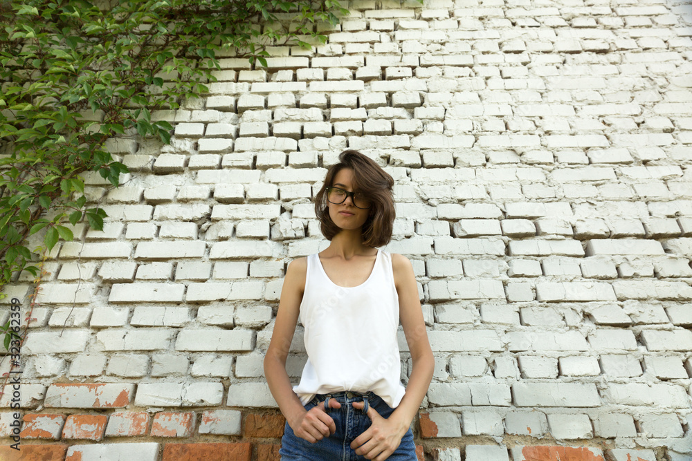 Portrait of a young student with glasses. Portrait of a young student with glasses.