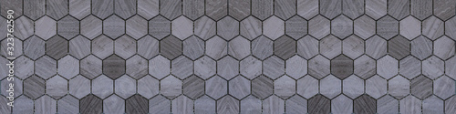 Gray modern tile mirror made of hexagonal tiles texture background banner panorama