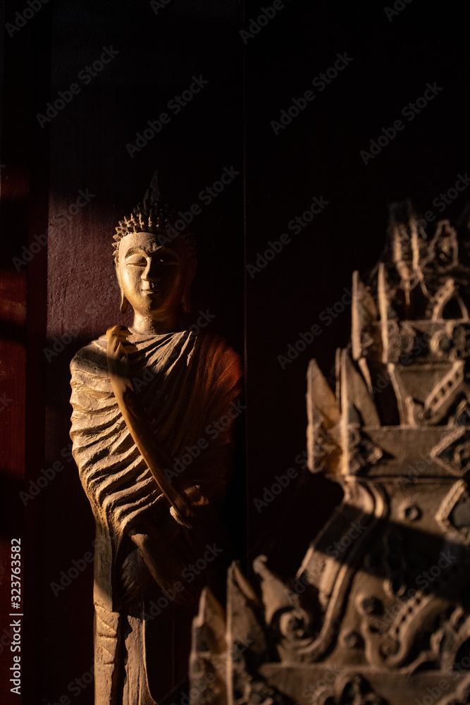 Buddha statues in Wat Xieng Thong in Luang Prabang , Laos